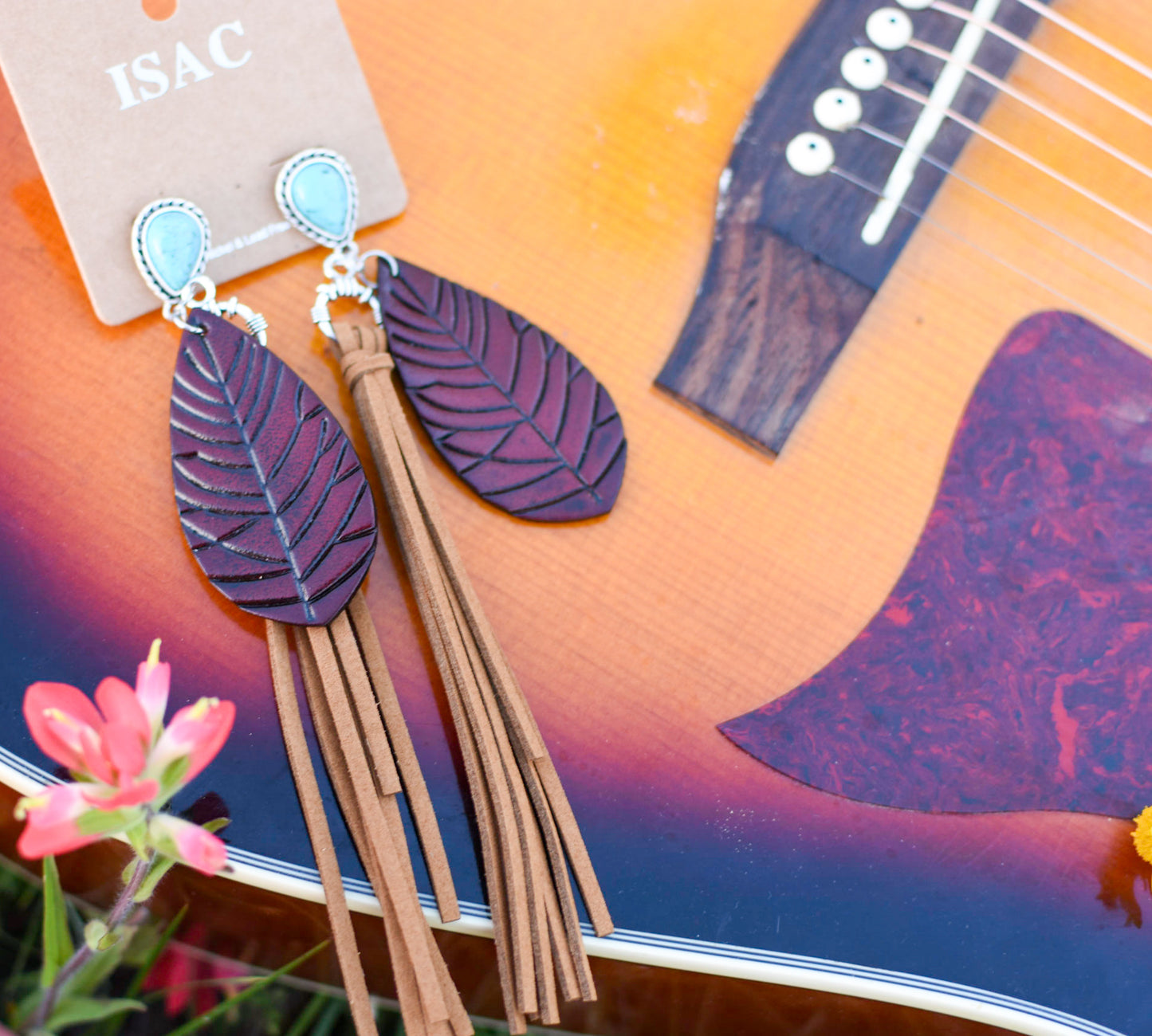 Tooled leather tassel earrings